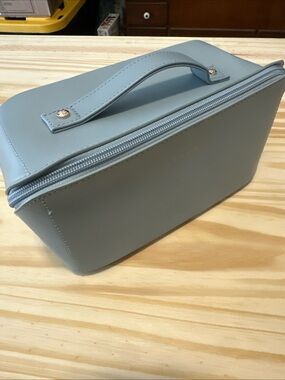 Compact Light Blue Women's Cosmetic Travel Case with Top Handle